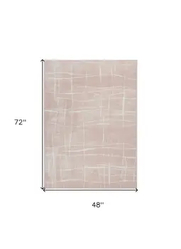 4' X 6' Pink and Ivory Abstract Geometric Area Rug