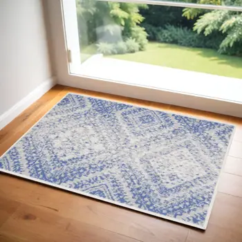 3' X 5' Blue and Ivory Geometric Distressed Area Rug