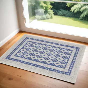 3' X 5' Ivory and Blue Geometric Distressed Area Rug