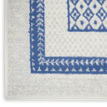 3' X 5' Ivory and Blue Geometric Distressed Area Rug