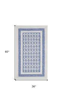 3' X 5' Ivory and Blue Geometric Distressed Area Rug
