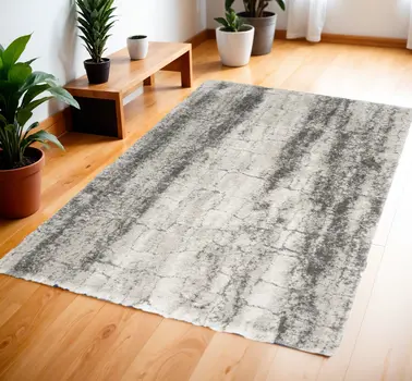 4' X 6' Charcoal and Ivory Abstract Shag Area Rug