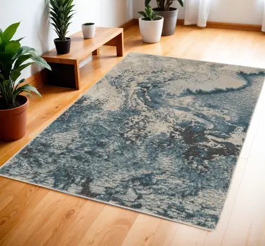 4' X 6' Ivory Teal Blue and Black Abstract Area Rug