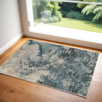 2' X 4' Ivory Teal Blue and Black Abstract Area Rug