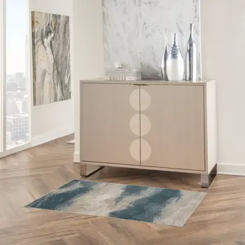 2' X 4' Ivory and Teal Blue Abstract Area Rug