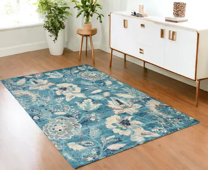 4' X 6' Turquoise Cream and Navy Blue Floral Distressed Area Rug