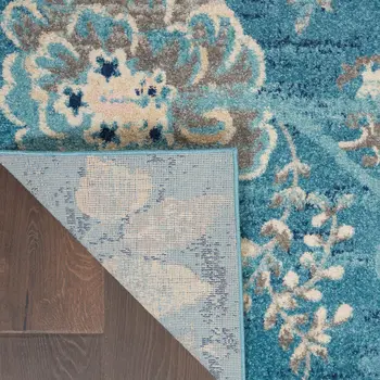 4' X 6' Turquoise Cream and Navy Blue Floral Distressed Area Rug