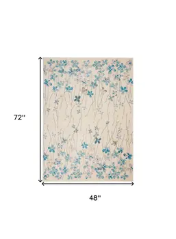 4' X 6' Ivory And Blue Floral Area Rug