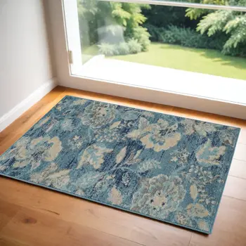 2' X 4' Turquoise Cream and Navy Blue Floral Distressed Area Rug