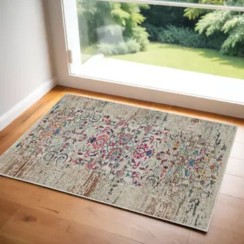 2' X 4' Ivory And Brown Floral Distressed Area Rug