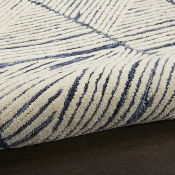 5' X 7' Blue And White Wool Abstract Area Rug