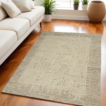 5' X 7' Beige and Tan Wool Abstract Area Rug