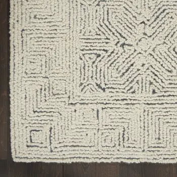 5' X 7' Navy Blue and Ivory Wool Abstract Area Rug