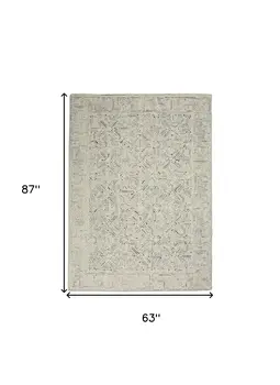 5' X 7' Navy Blue and Ivory Wool Abstract Area Rug