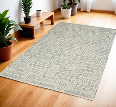 4' X 6' Ivory And Turquoise Wool Geometric Area Rug