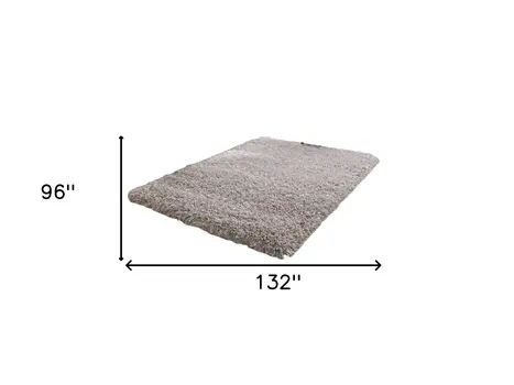 8' X 11' Beige Shag Hand Tufted Area Rug