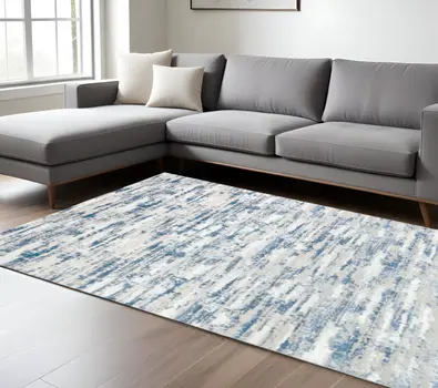 8' X 11' Navy Blue Gray And Off White Abstract Washable Area Rug