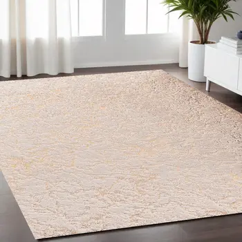 5' X 7' Beige and Gold Faux Fur Abstract Shag Non Skid Area Rug