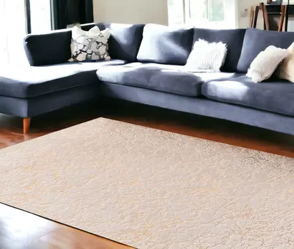 8' X 11' Beige and Gold Faux Fur Abstract Shag Non Skid Area Rug
