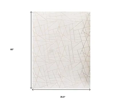 3' X 5' White and Gold Faux Fur Abstract Shag Non Skid Area Rug