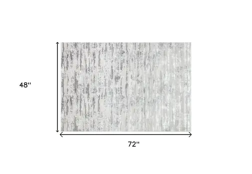 4' X 6' Silver Gray And Off White Abstract Washable Area Rug