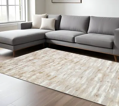 10' X 13' Beige Ivory And Off White Abstract Washable Area Rug