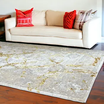 9' X 12' Beige and Gold Abstract Area Rug