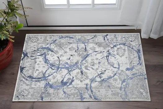 3' X 5' Ivory Blue And Gray Abstract Area Rug