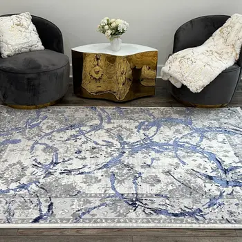 9' X 12' Ivory Blue And Gray Abstract Area Rug
