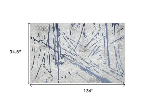 8' X 11' Ivory and Blue Abstract Area Rug