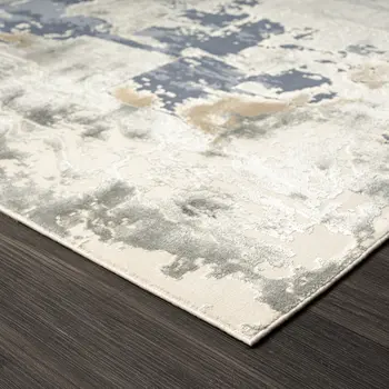 2' X 3' Blue and Beige Abstract Area Rug