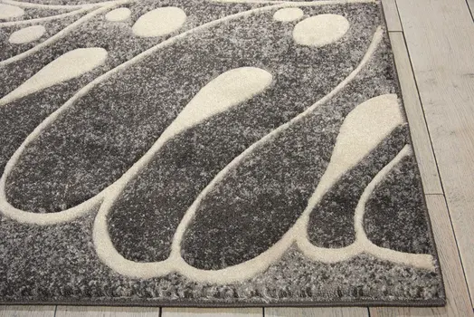 8' X 11' Ivory Black and Gray Botanical Leaves Area Rug