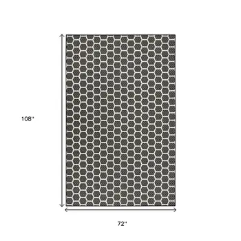 4' X 6' Black And Ivory Geometric Indoor Outdoor Area Rug
