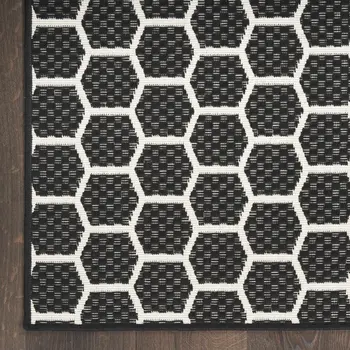 6' X 9' Black And Ivory Geometric Indoor Outdoor Area Rug