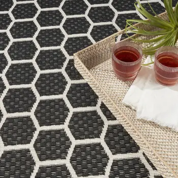 6' X 9' Black And Ivory Geometric Indoor Outdoor Area Rug