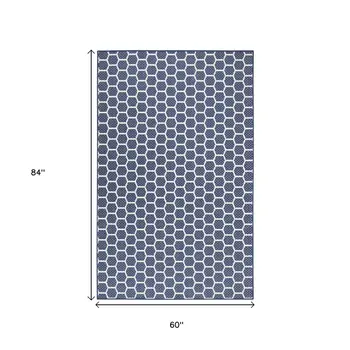 6' X 9' Navy Blue And Ivory Geometric Indoor Outdoor Area Rug