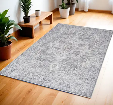 4' X 6' Ivory and Gray Floral Medallion Power Loom Distressed Area Rug