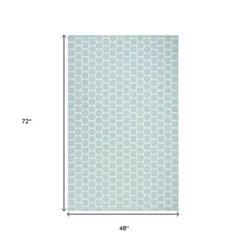 5' X 7' Aqua And Ivory Geometric Indoor Outdoor Area Rug