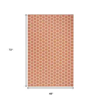 5' X 7' Coral And Ivory Geometric Indoor Outdoor Area Rug
