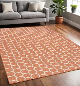 5' X 7' Coral And Ivory Geometric Indoor Outdoor Area Rug