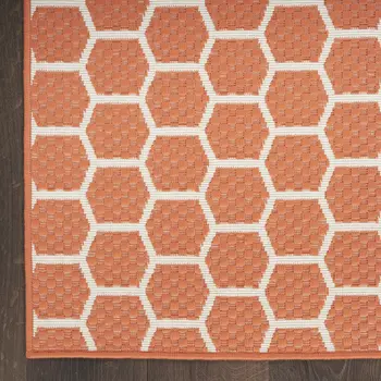 5' X 7' Coral And Ivory Geometric Indoor Outdoor Area Rug