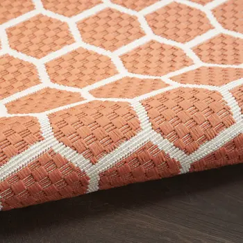 5' X 7' Coral And Ivory Geometric Indoor Outdoor Area Rug