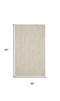 3' X 5' Ivory And Silver Geometric Indoor Outdoor Area Rug