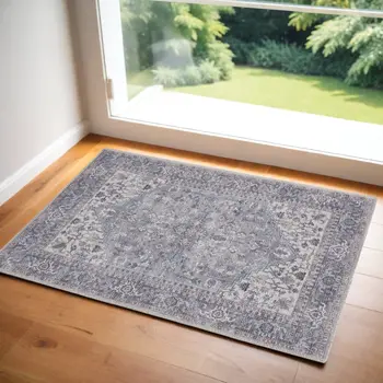 3' X 5' Blue and Beige Floral Power Loom Distressed Area Rug