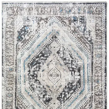 2' X 3' Gray Beige and Blue Geometric Distressed Area Rug With Fringe