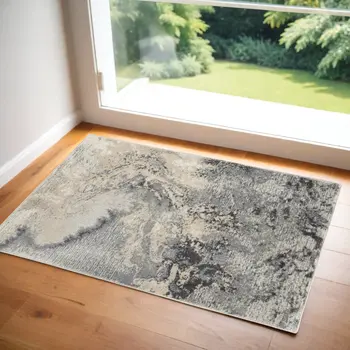 2' X 4' Gray Beige and Ivory Abstract Area Rug