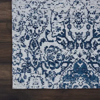 8' X 10' Navy Blue And Ivory Damask Distressed Area Rug