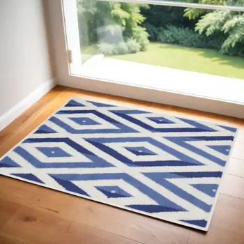 2' X 3' Ivory and Blue Geometric Area Rug