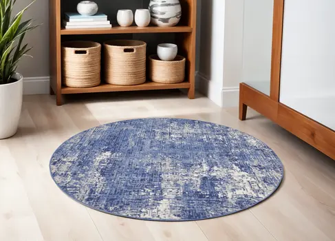 5' Ivory and Blue Abstract Distressed Round Rug