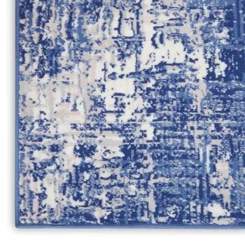 7' X 10' Ivory and Blue Abstract Distressed Area Rug